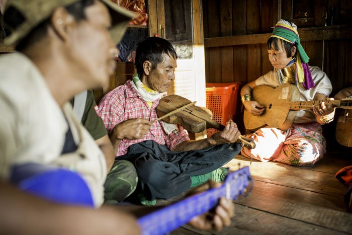 Kayan ethnic minority people in Myanmar playing guitar and violin