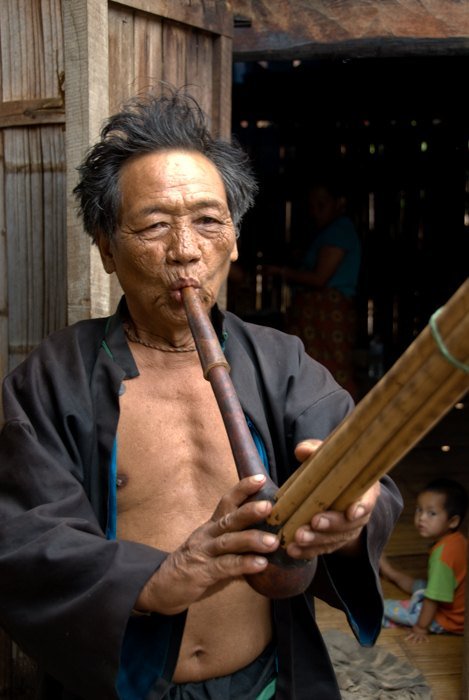 Lahu Musician in Mae Hong Son Province, Thailand. Tips For Travel Photography etiquette in Thailand