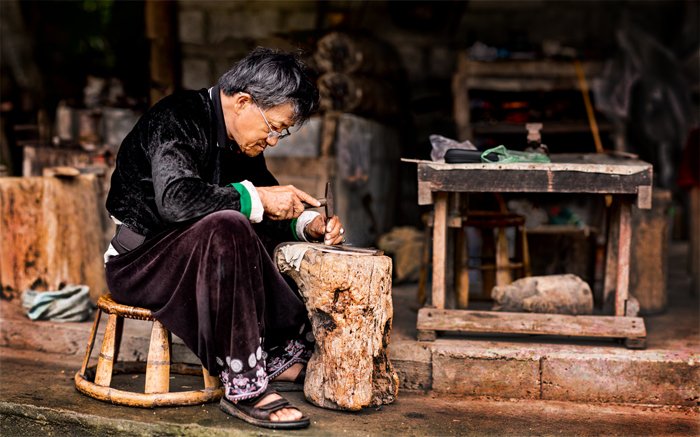 Hmong Blacksmith Stitched taken during a Chiang Mai Photo Workshop