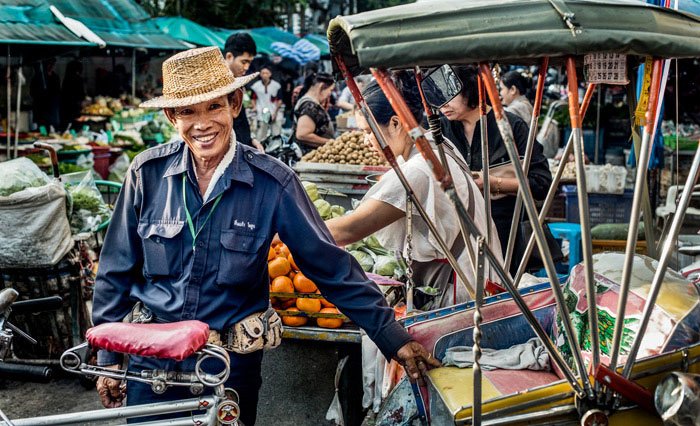  Samlor Rider med sin trehjuling i Chiang Mai, Thailand